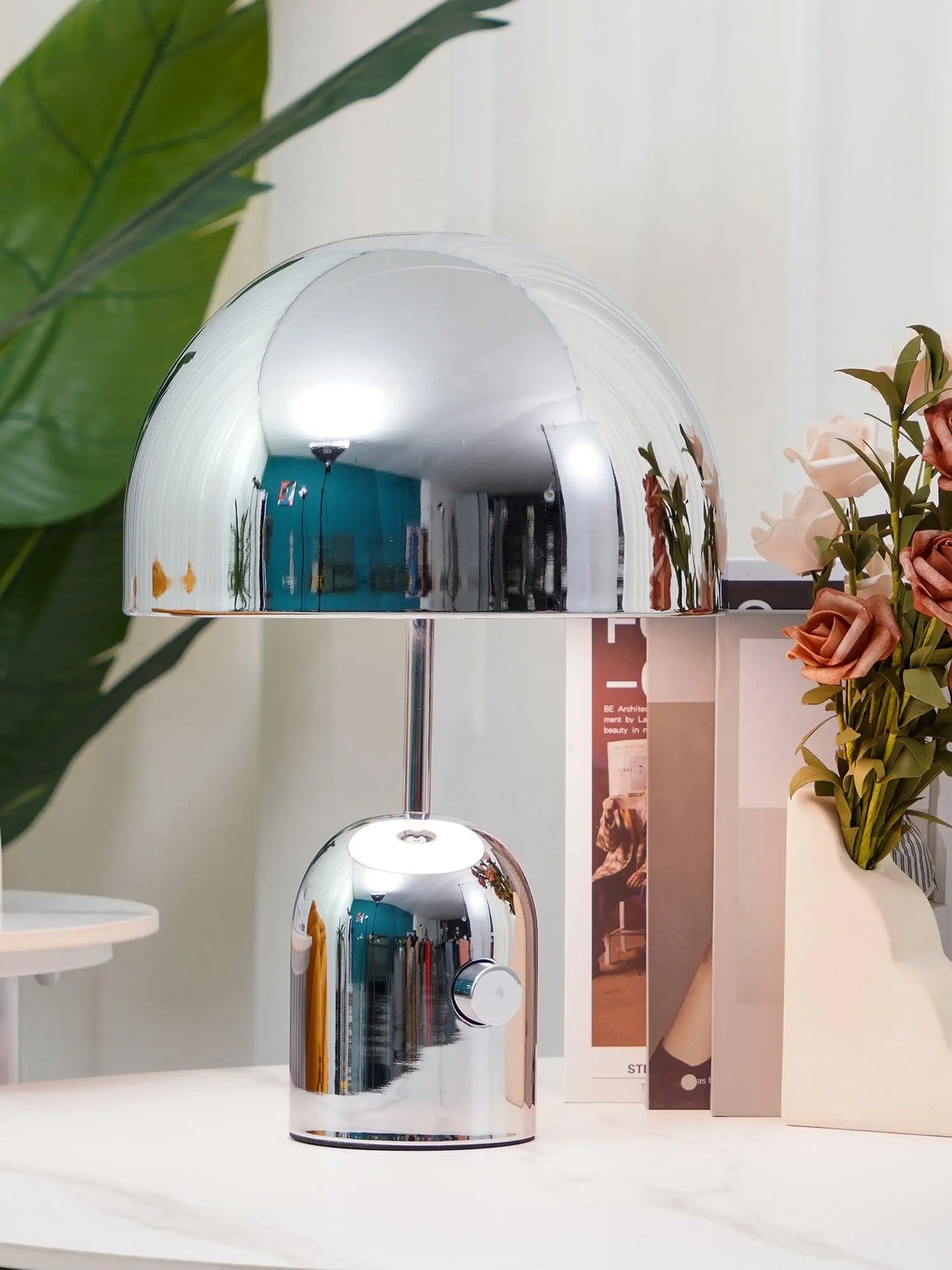 Elegant BellaGlow bell-shaped table lamp in chrome finish, perfect for adding soft ambient lighting to any space.