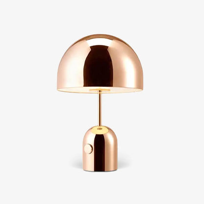 Elegant BellaGlow bell-shaped table lamp in rose gold, adding a touch of sophistication to interior decor.