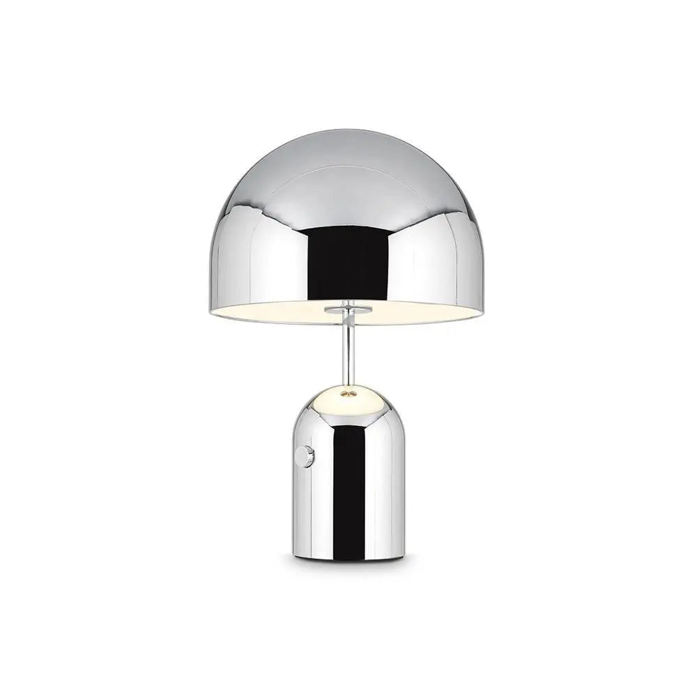Chrome BellaGlow bell-shaped table lamp illuminated, casting a soft LED glow for cozy ambient lighting.