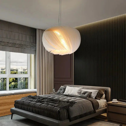 ClearGlow ceiling light in a contemporary bedroom, offering stylish and efficient illumination.