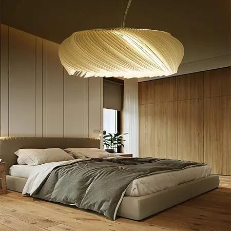 ClearGlow ceiling light providing soft, adjustable lighting for a cozy, modern bedroom setting.