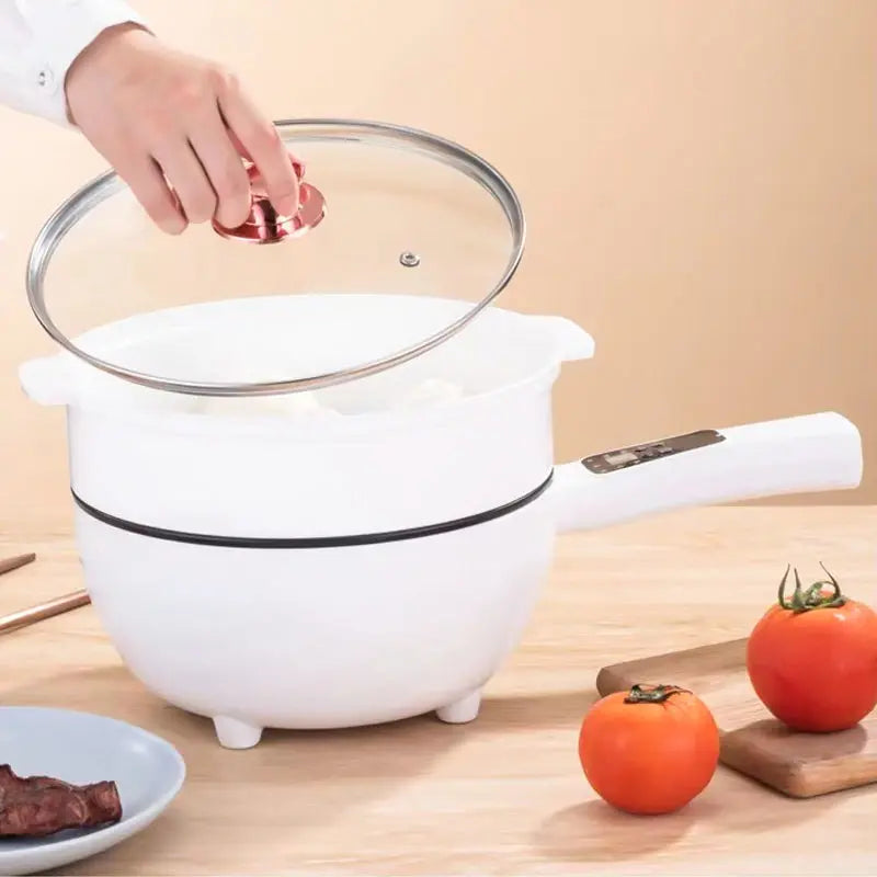 Compact FlexiChef electric pot shown with tempered glass lid and steam vent.