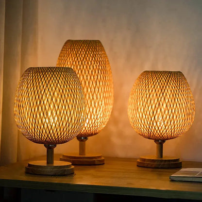 Full view of the EcoGlow vintage-inspired bamboo table lamp, showcasing its woven bamboo design and soft glow.