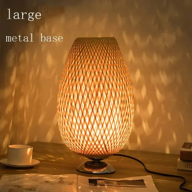 The EcoGlow bamboo lamp with a sleek metal base, offering a contemporary twist to the vintage design.