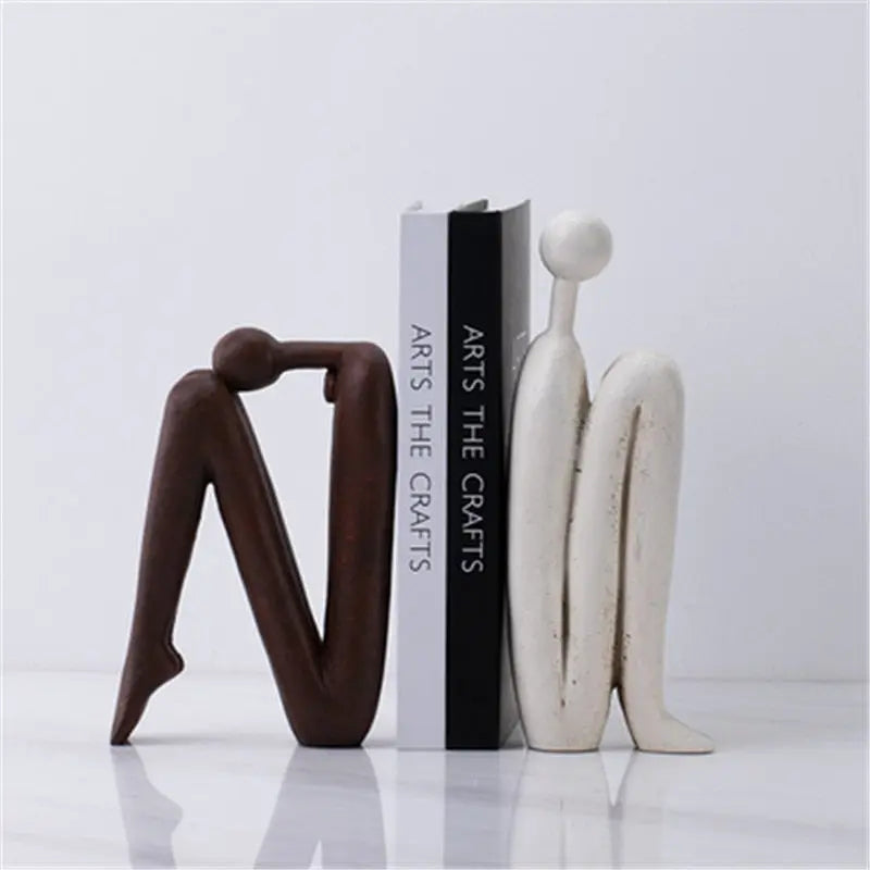 Front view of EleganceHold artistic bookend featuring a minimalist metal design.