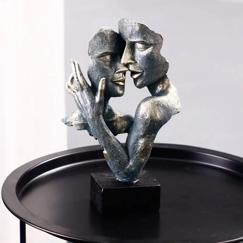 Elegant Embrace sculpture capturing the essence of connection with smooth, graceful lines and a polished finish.