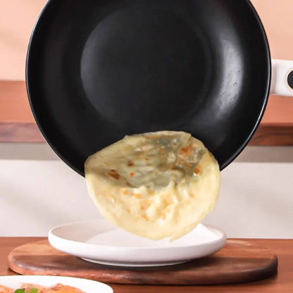 Non-stick interior of FlexiChef cooking pot, ideal for effortless cooking and cleaning.