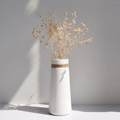 NaturalCharm rustic vase used as an accent in a neutral-toned room, enhancing the natural aesthetic.