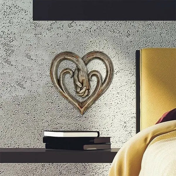RusticLove wooden sculpture placed on a side table in a bedroom, adding a warm, rustic charm to the space.