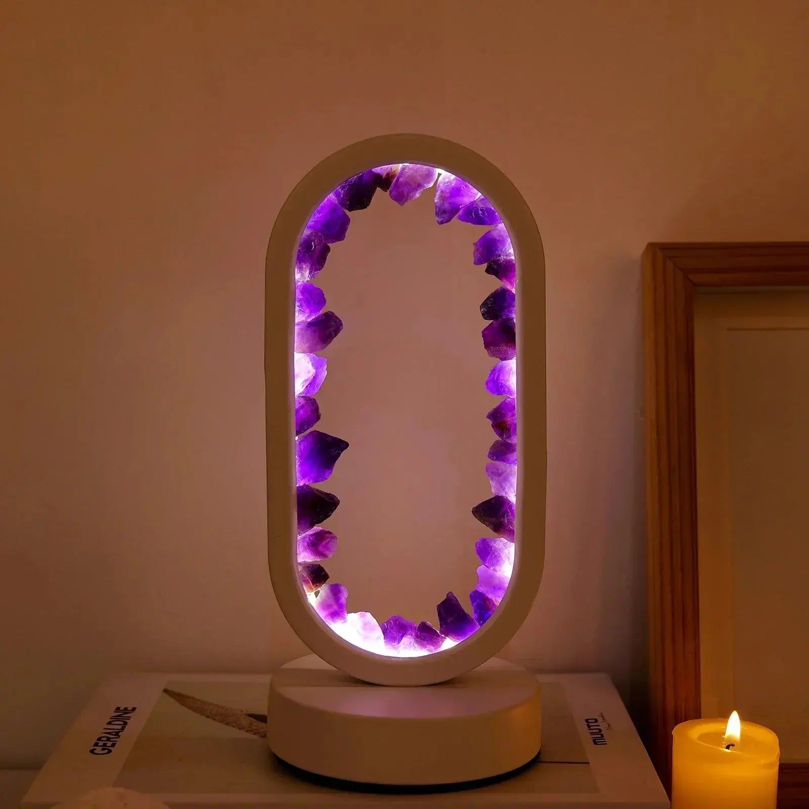 SerenityStone lamp glowing softly, creating a calming ambiance in a darkened room.