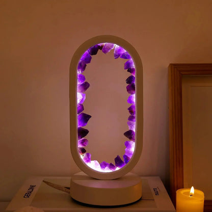 SerenityStone lamp glowing softly, creating a calming ambiance in a darkened room.