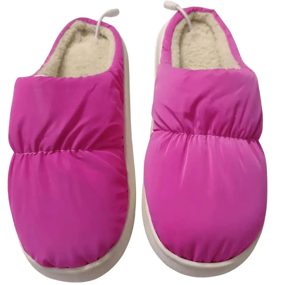 Overhead view of WarmCozy heated slippers, highlighting the spacious and comfortable interior.