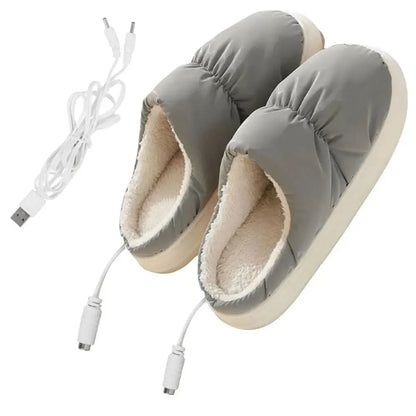 Close-up of the USB connection for the WarmCozy heated slippers, illustrating easy plug-in for adjustable warmth.