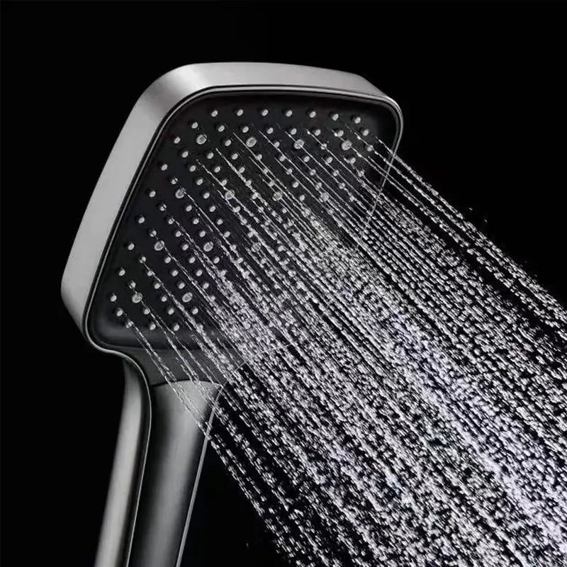 AquaLuxe shower head demonstrating high water pressure, designed for an invigorating shower experience.