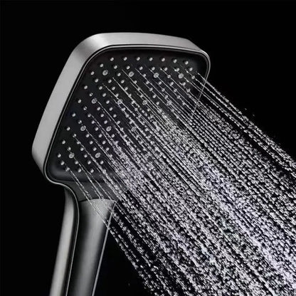 AquaLuxe shower head demonstrating high water pressure, designed for an invigorating shower experience.