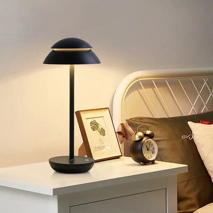 BrightEase rechargeable lamp in a bedroom setting, adding functional lighting