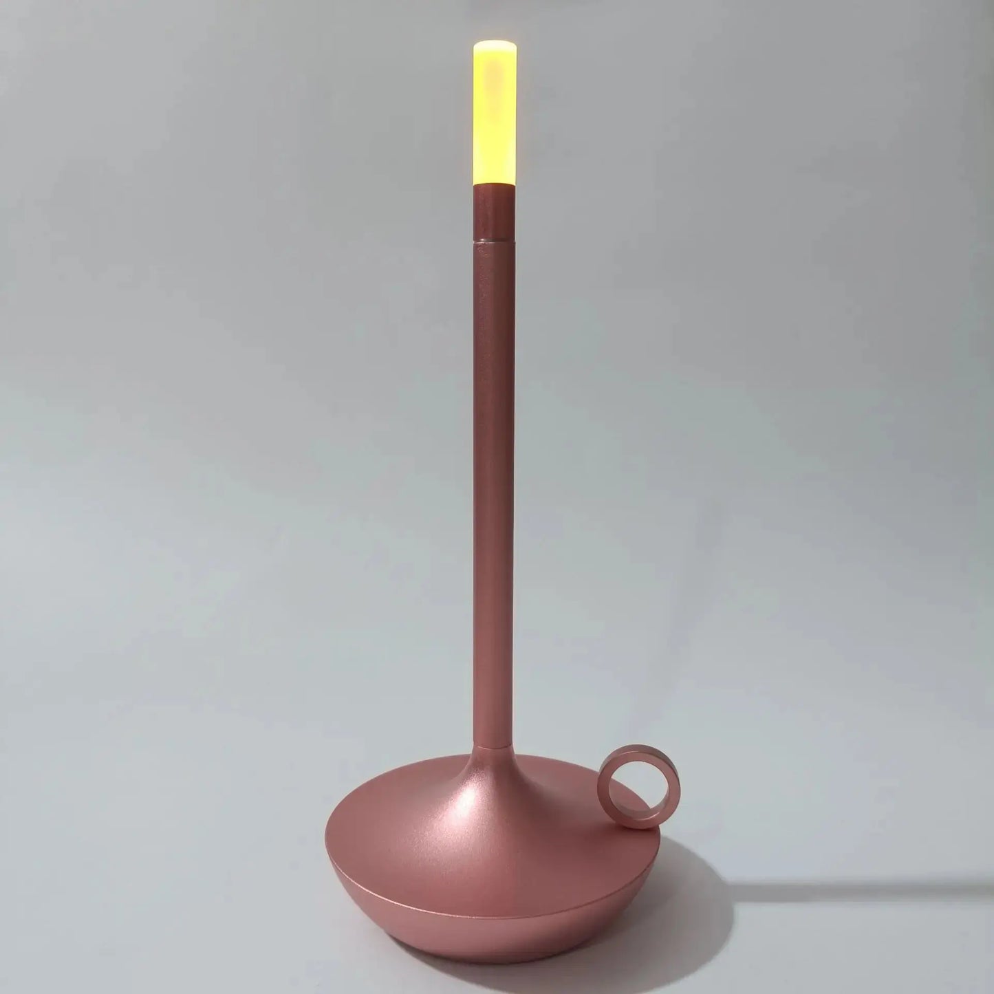 BrightFlex LED desk lamp at a dimmed setting, providing a softer light for relaxation or low-light environments.