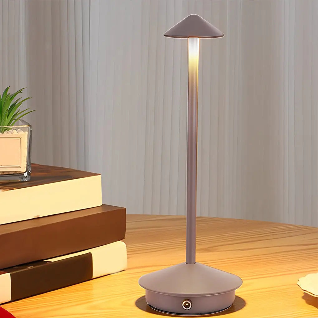 GlowMushroom lamp on a desk, perfect for task lighting with 3-level dimming