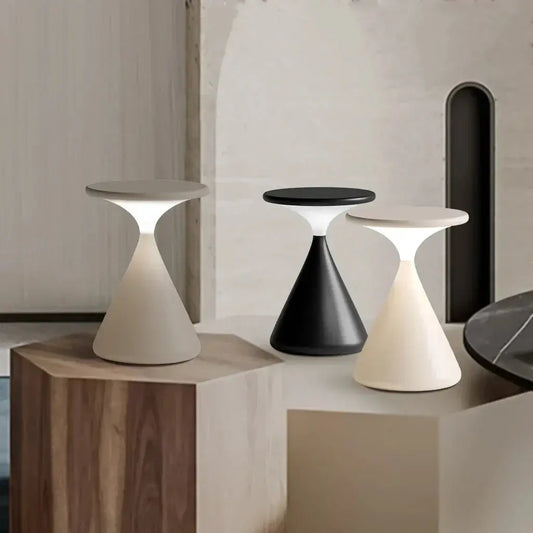 Front view of the GlowSphere cordless hourglass lamp, showcasing its unique hourglass design and sleek, modern aesthetic.