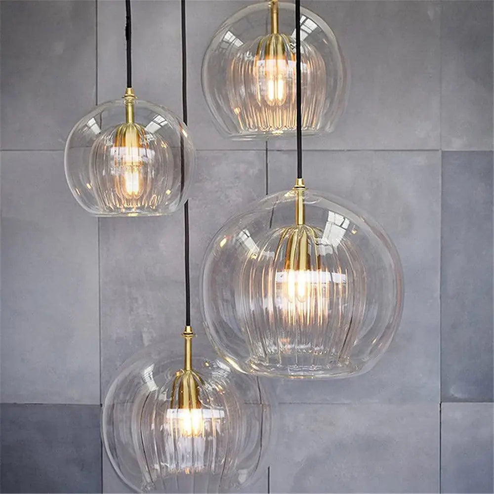 Multiple LumiaAmber pendant lights arranged together for a stylish look - 3