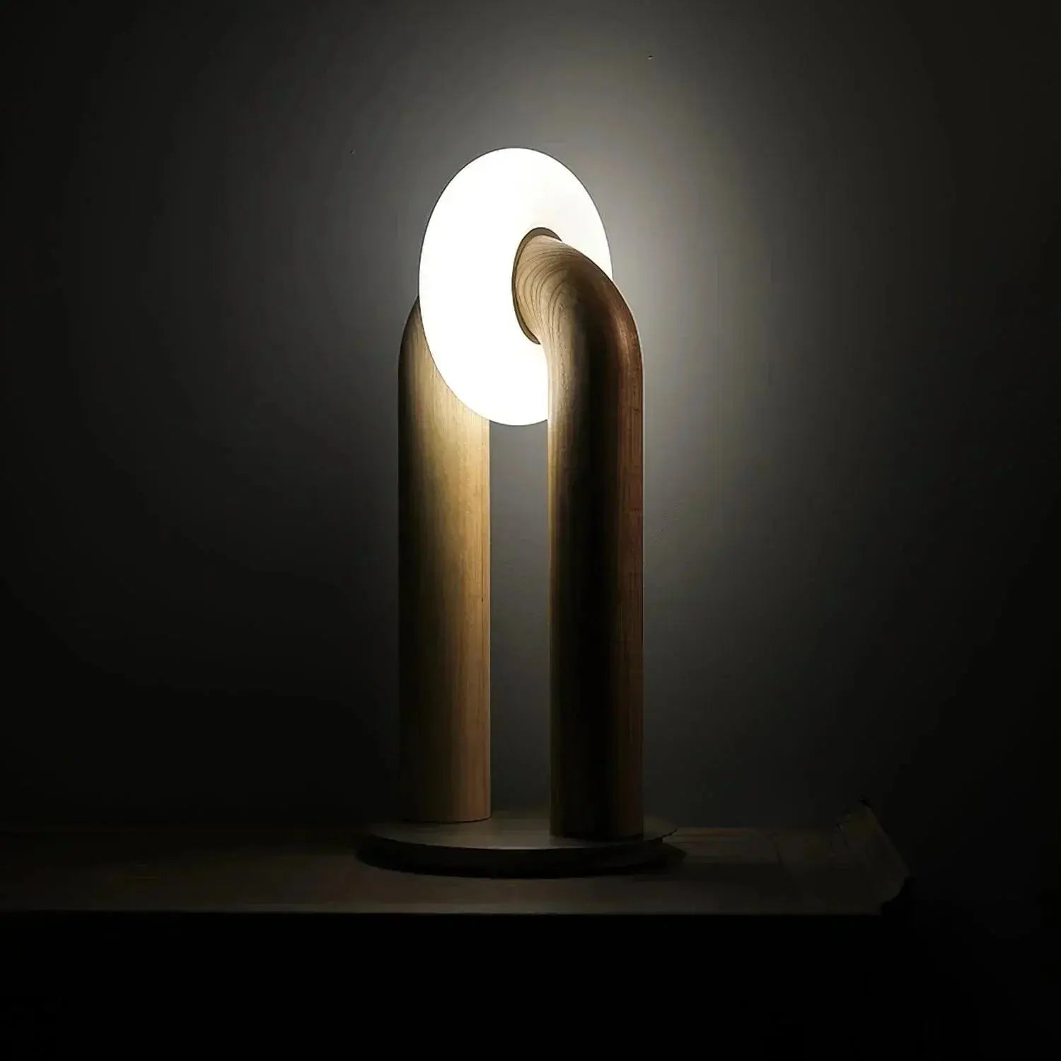 LumiArch lamp casting warm, ambient light in a cozy living room setting