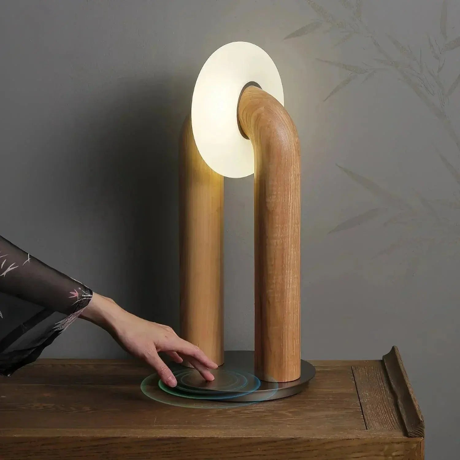 LumiArch arched table lamp providing sleek, modern lighting on a desk