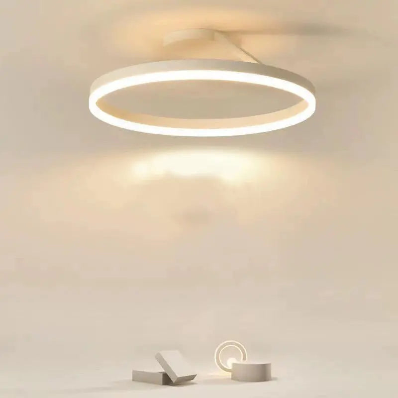 LuxeGlow LED ceiling light illuminating a stylish interior, creating a warm and elegant ambiance.