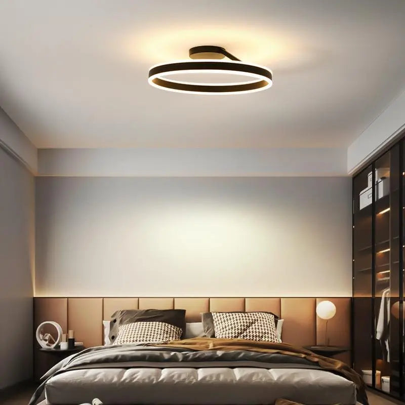 LuxeGlow ceiling light integrated into modern decor, adding a touch of elegance with its gold and metal structure.