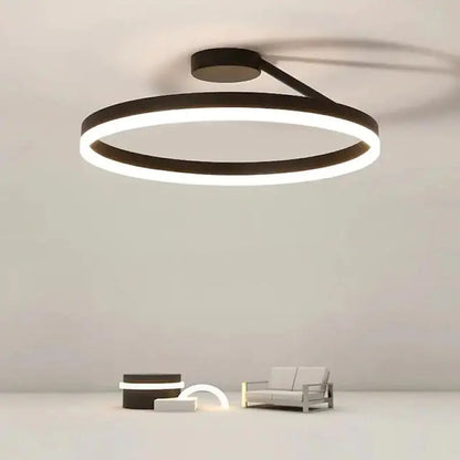 LuxeGlow ceiling light integrated into modern decor, adding a touch of elegance with its gold and metal structure.