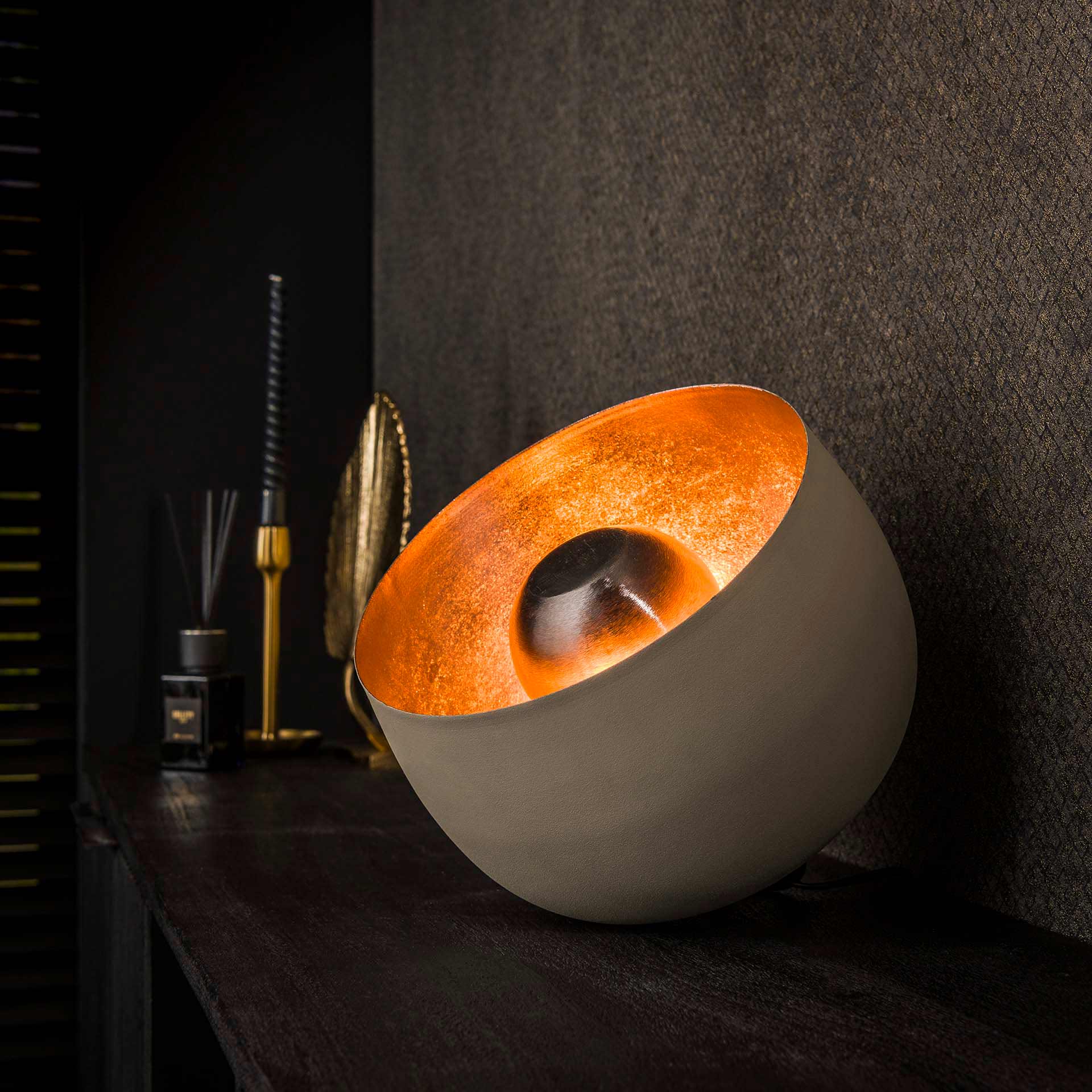 MetroGlow lamp casting warm, inviting ambient light across a room