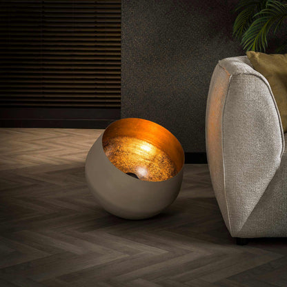 MetroGlow lamp emitting soft ambient lighting in a cozy room setting