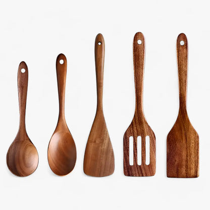 Detailed view of the NatuRease teak wood spatula and spoon, showcasing their ergonomic handles and refined craftsmanship.