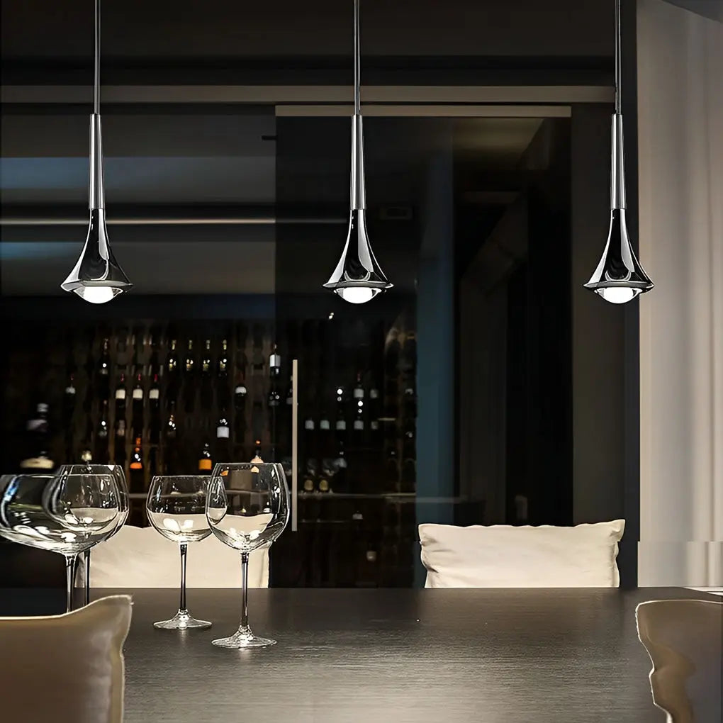 ScandiDrop pendant light displayed above a table, offering a cozy ambiance ideal for dining or gathering spaces.