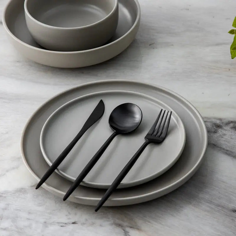 Side view of SleekSet cutlery set including knife, fork, and spoon with modern design - 3