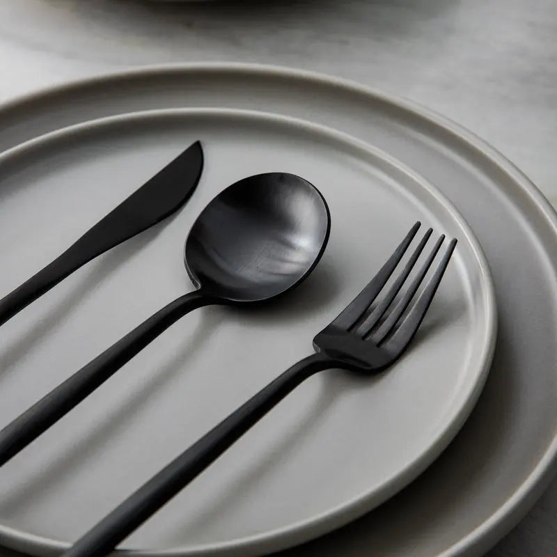 Side view of SleekSet cutlery set including knife, fork, and spoon with modern design - 4