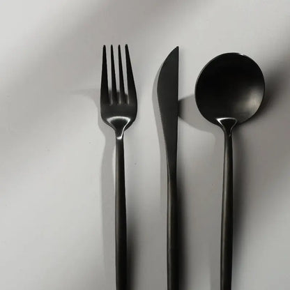 Top view of SleekSet cutlery collection neatly arranged on a table setting - 3