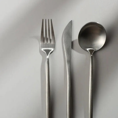 Top view of SleekSet cutlery collection neatly arranged on a table setting