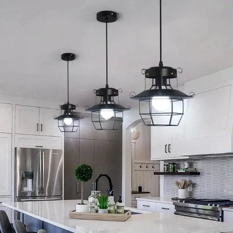 Multiple VintageCage pendant lights arranged in a row for dramatic industrial lighting effect